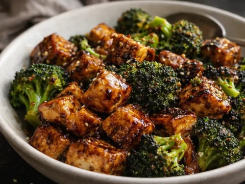 A Sheet Pan Filled With A Chicken Broccoli Skillet Glazed In Honey