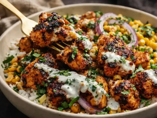 A Vibrant Street Corn Chicken Bowl With Grilled Chicken, Creamy Corn, Cotija